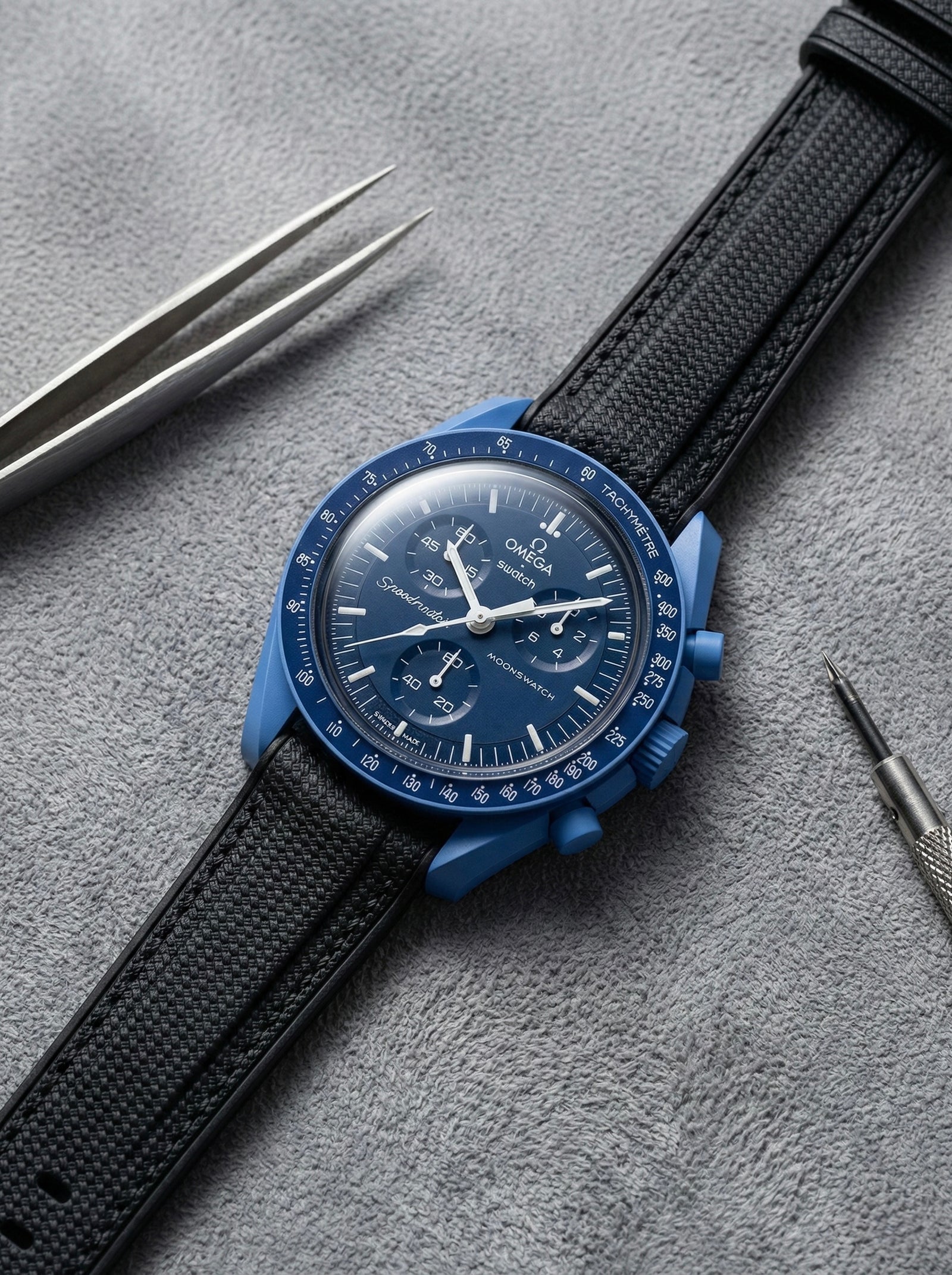 Black stitch rubber strap for Omega x Swatch MoonSwatch Mission to Neptune. 